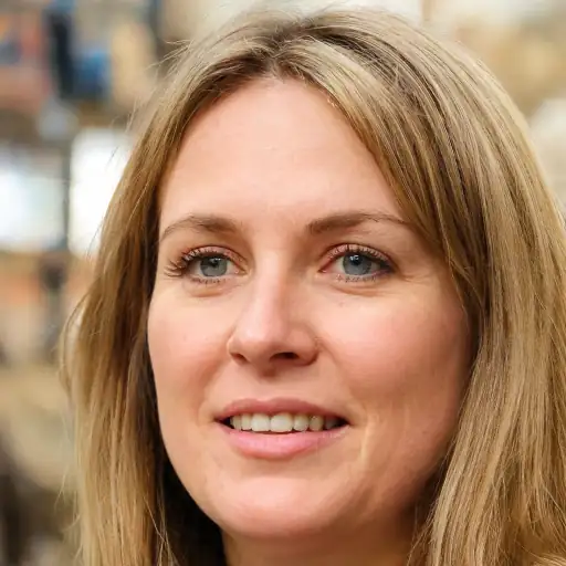 Young woman smiling, showing smooth skin