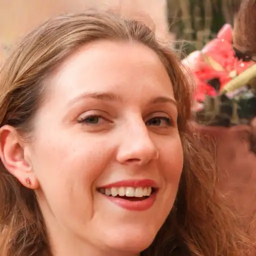 Portrait of a satisfied customer wearing Clara sandals