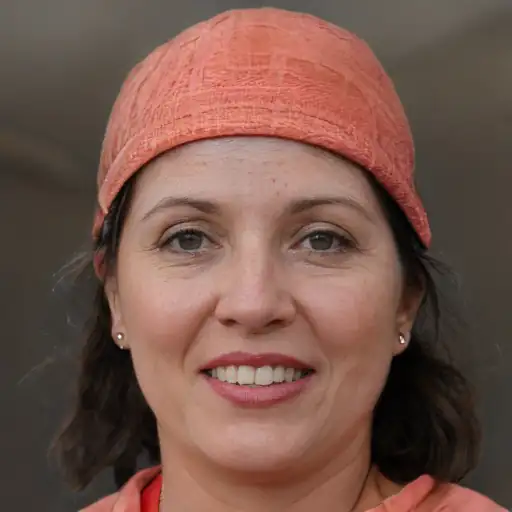 Smiling woman using skincare