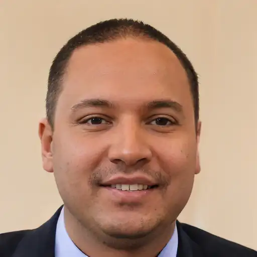 A man in his 40s admiring his improved hair texture.