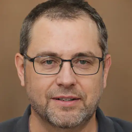 A man in his 40s with a healthy complexion.