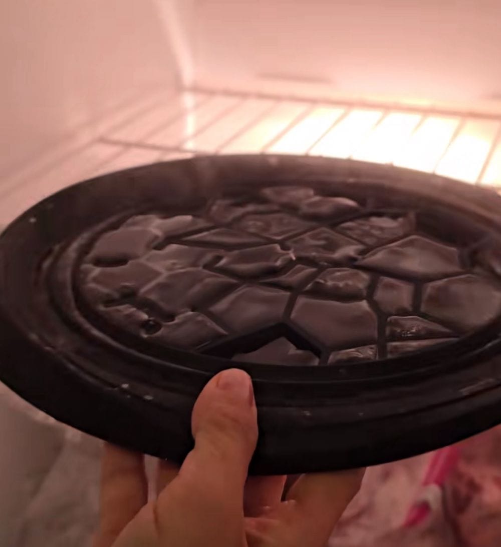 A serene spa setting with a foldable ice bath bowl ready for use.