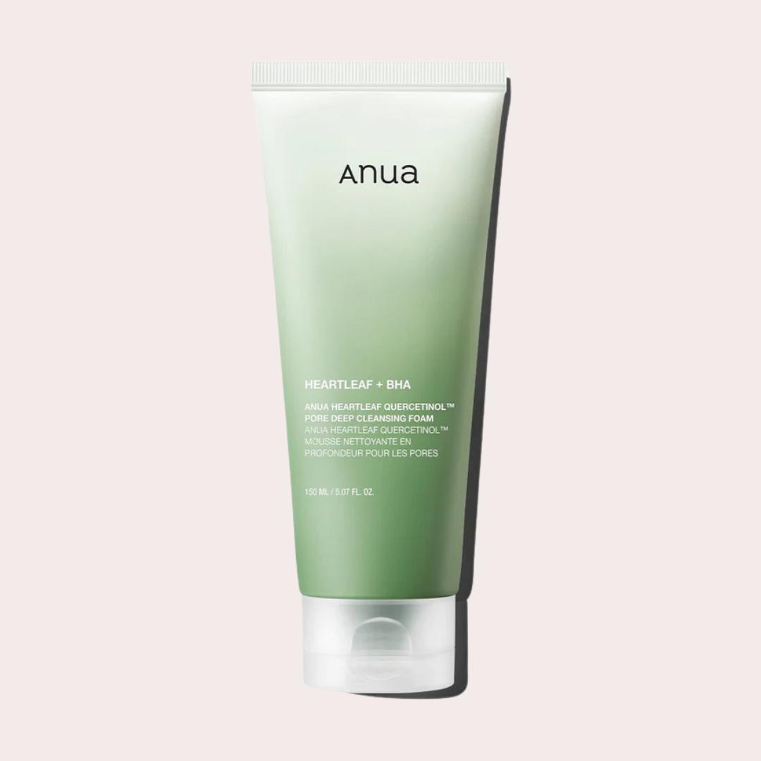 Applying cleansing oil to face