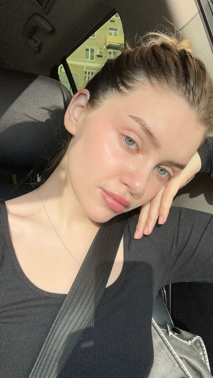 Close-up of a person's smooth, glowing skin after using the product.