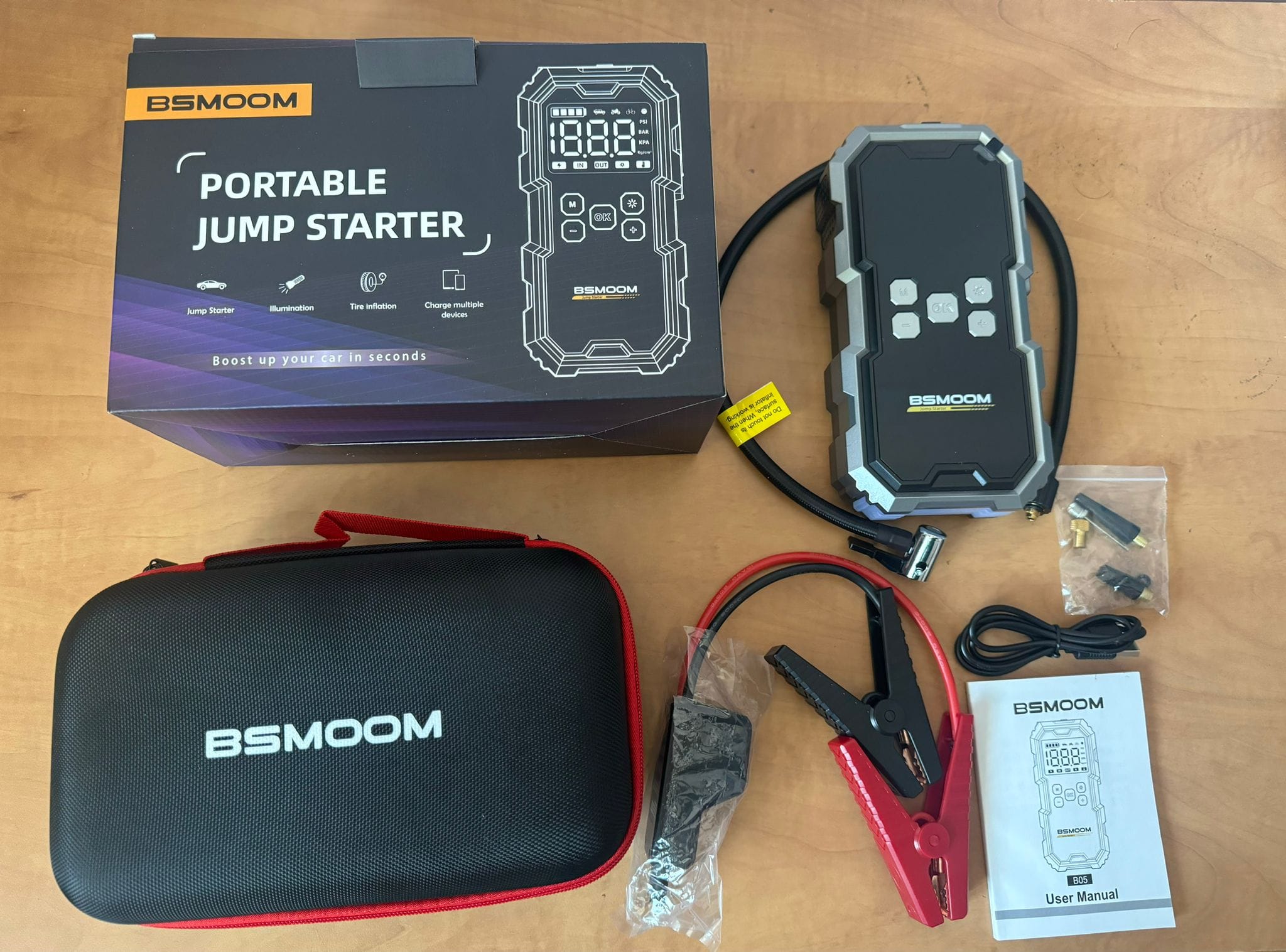 Portable Multi-Function Car Jump Starter & Booster in action