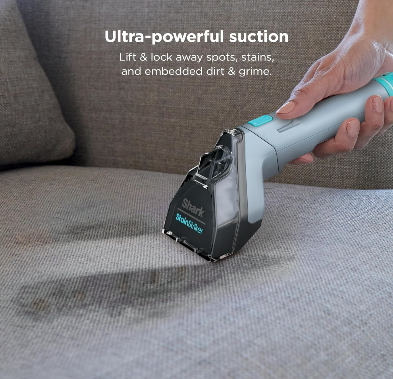 The Shark StainStriker Portable Carpet & Upholstery Cleaner in a living room setting.