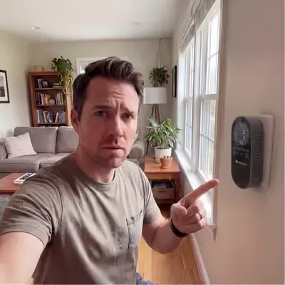 Firefighter certified badge on a carbon monoxide detector.