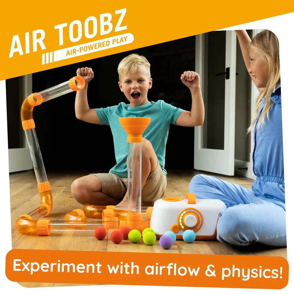 Children playing with air-powered toy