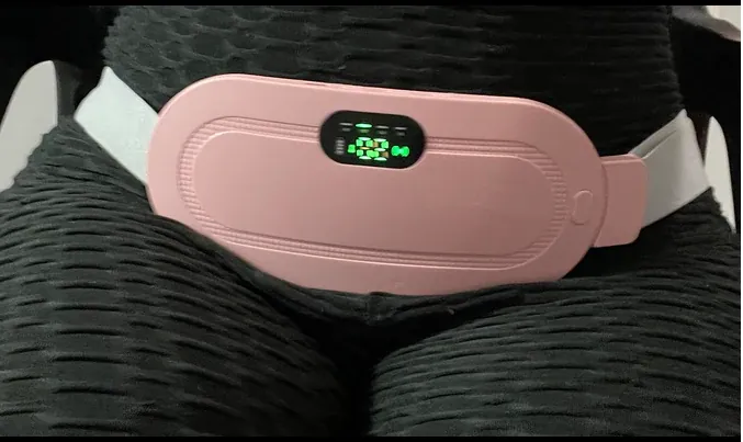 Experience soothing relief with our ergonomic heating pad, designed for women's comfort.