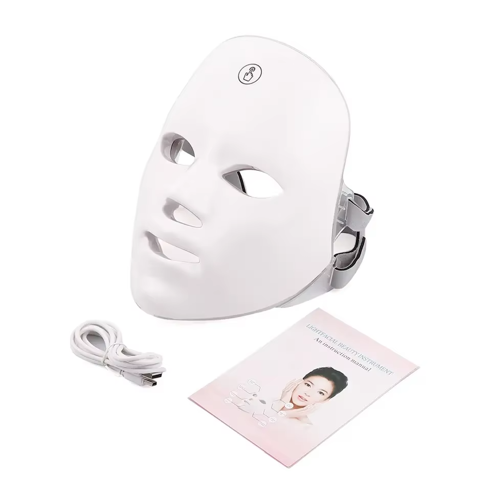 Woman using LED facial mask