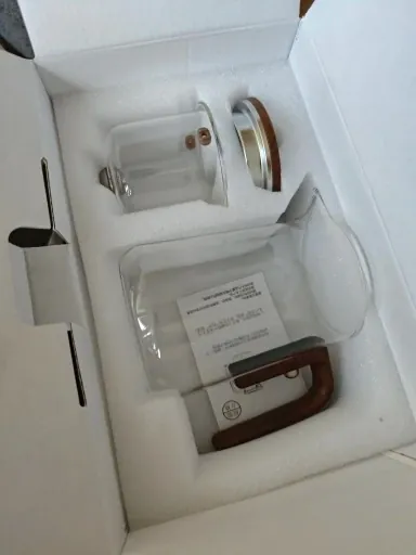 Teapot with wooden handle and smooth brew