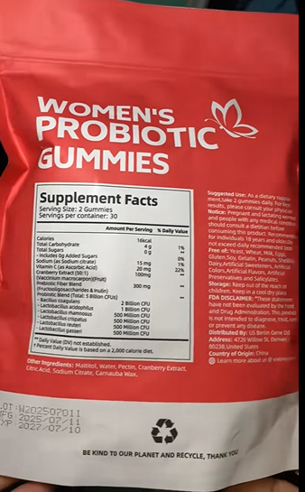 Happy woman holding ProductX Feminine Balance Gummies
