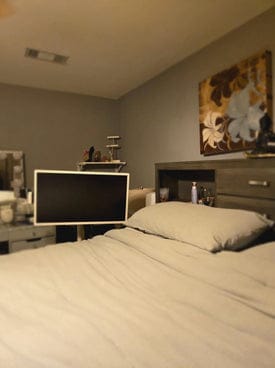 User appreciating the large screen size