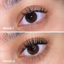 Woman admiring her long, voluminous lashes