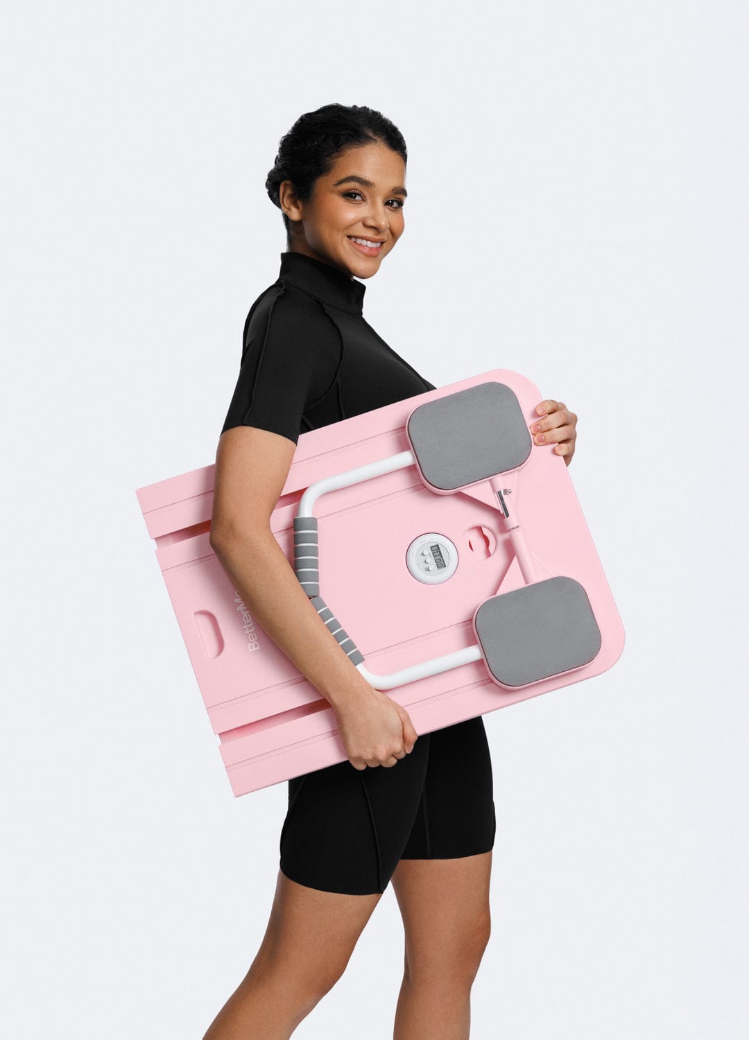 Personne étirant son corps sur le Mini Reformer