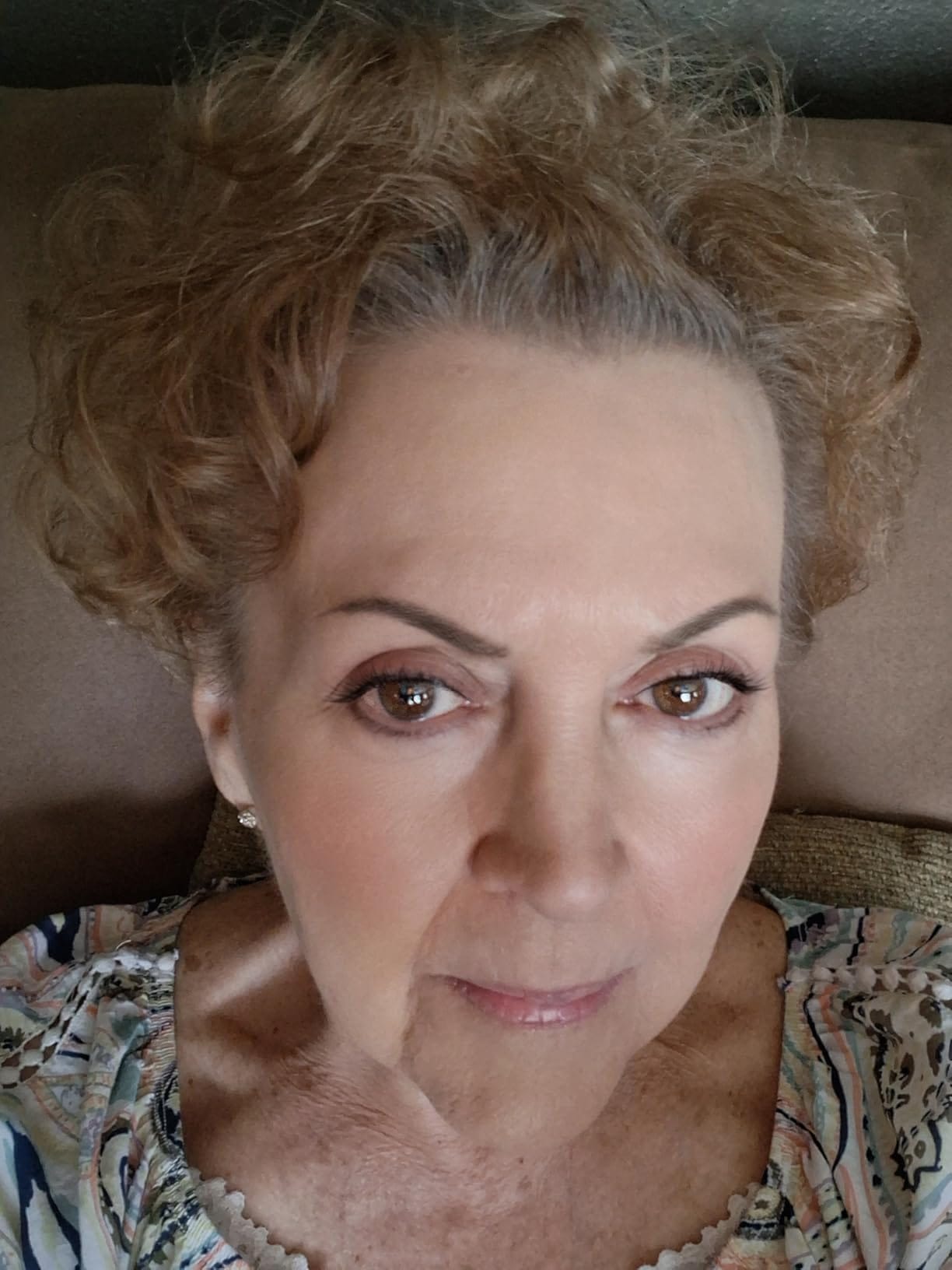 Person applying balm to their face