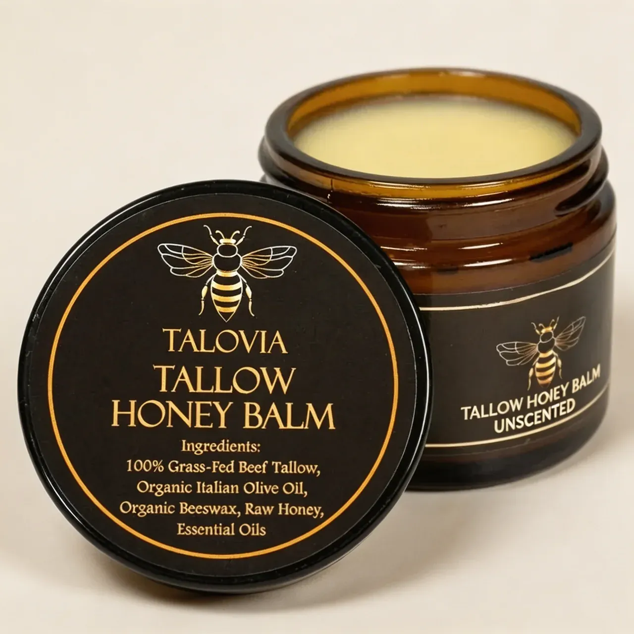 Close-up of a hand gently applying Talovia Tallow Honey Balm, showcasing its rich texture.