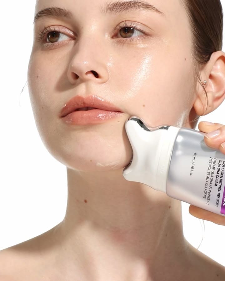 Neck cream with built-in guasha roller