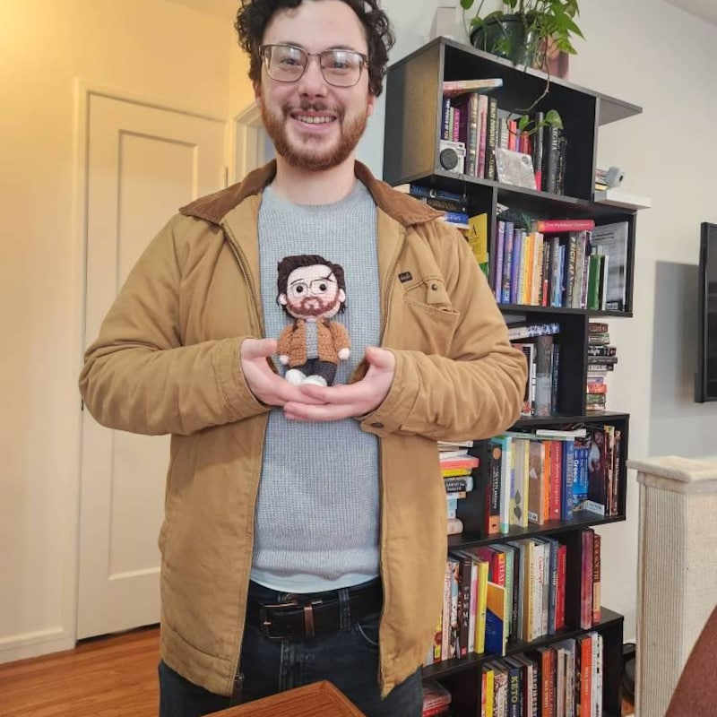 Close-up of a custom crochet doll's face