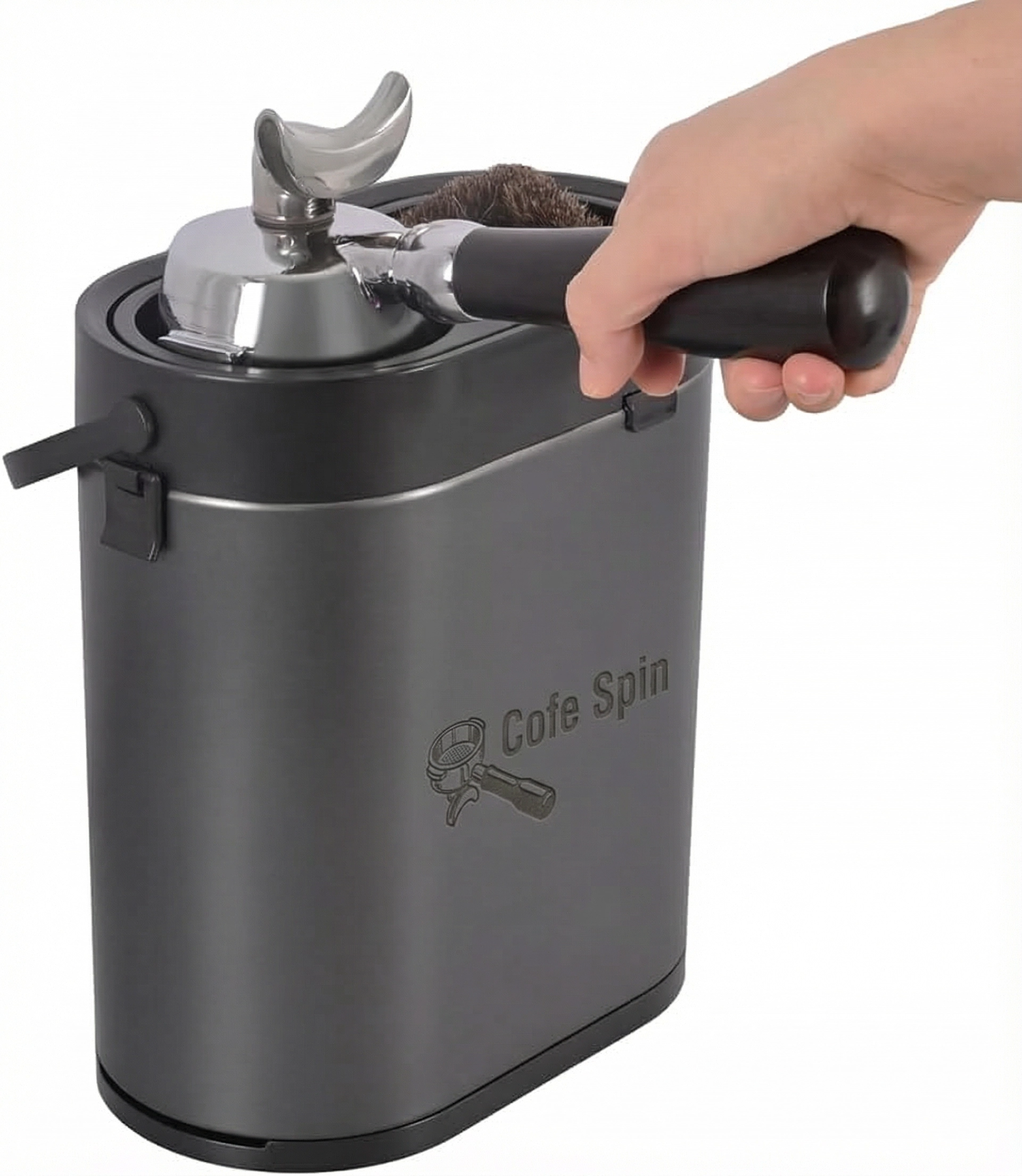 Brush cleaning coffee grounds from the portafilter