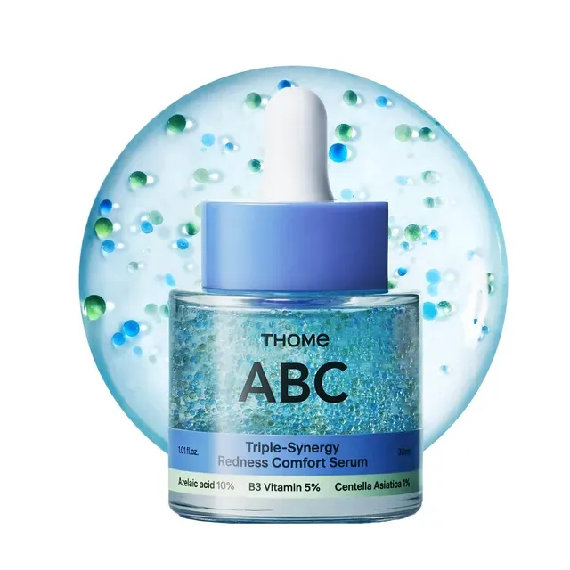 Close-up of skin with a subtle, healthy glow, reflecting light.