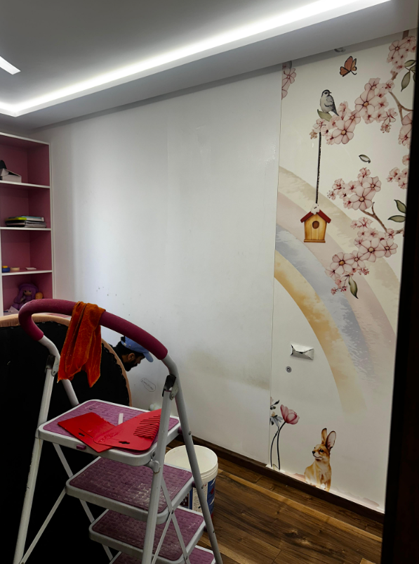 Installation de papier peint par un professionnel