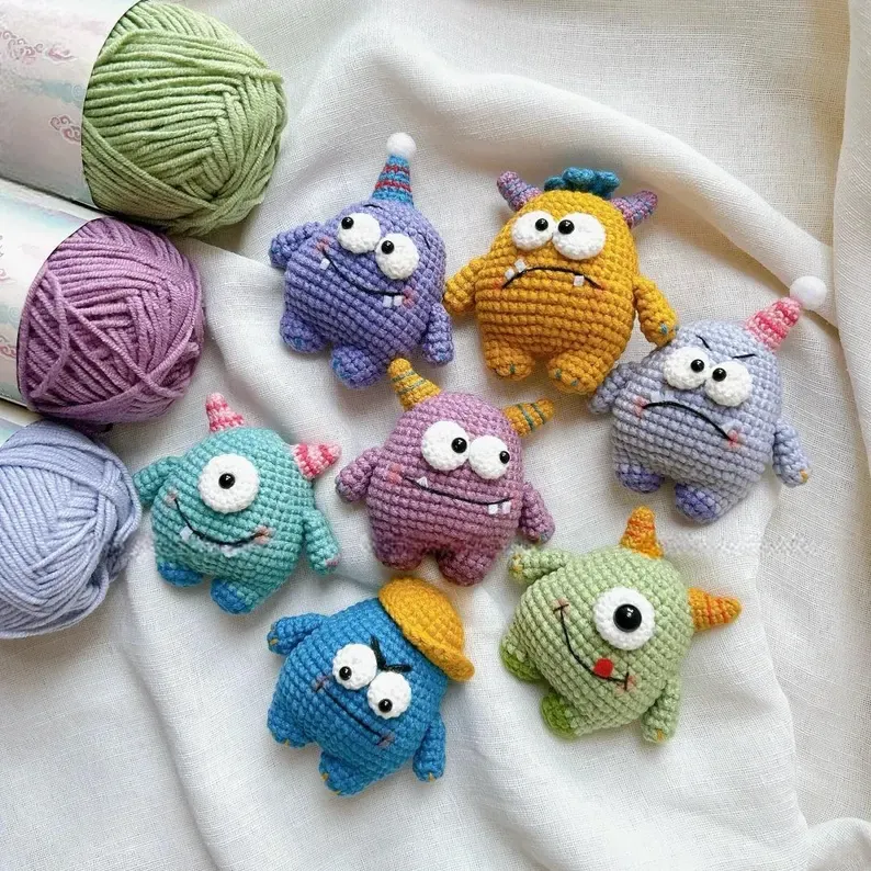 Close-up of a detailed amigurumi doll with charming accessories.