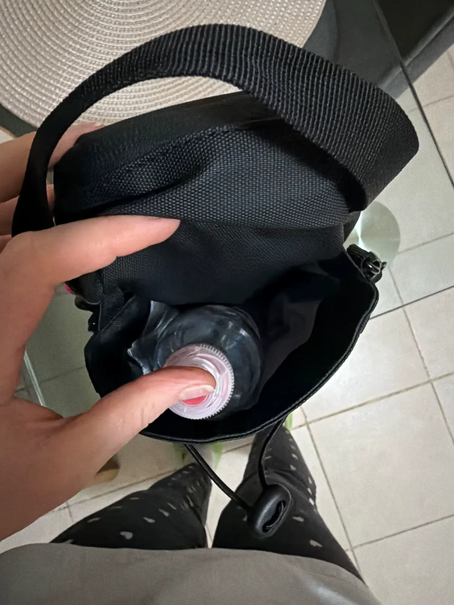 Runner with water bottle easily accessible via magnetic holder