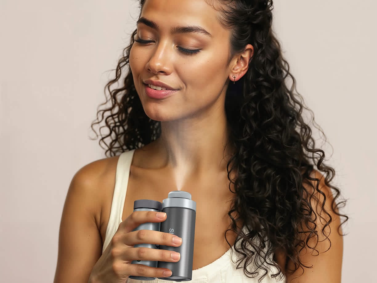 Shark ChillPill device in use, showing mist feature