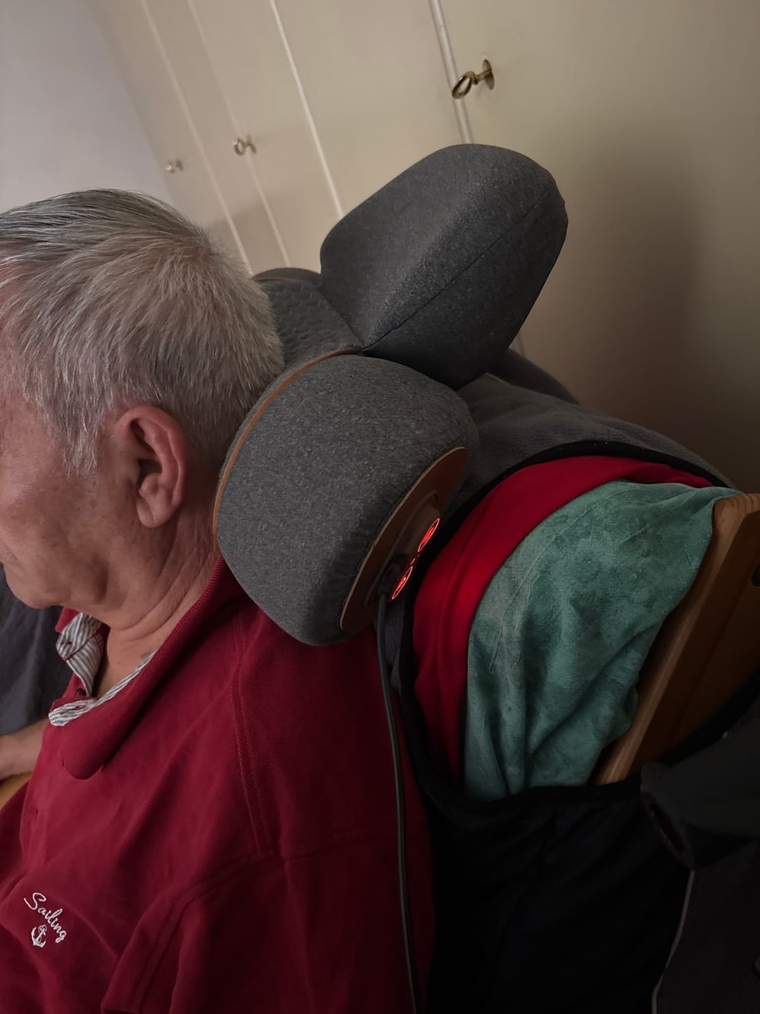 Satisfied customer using neck relief device