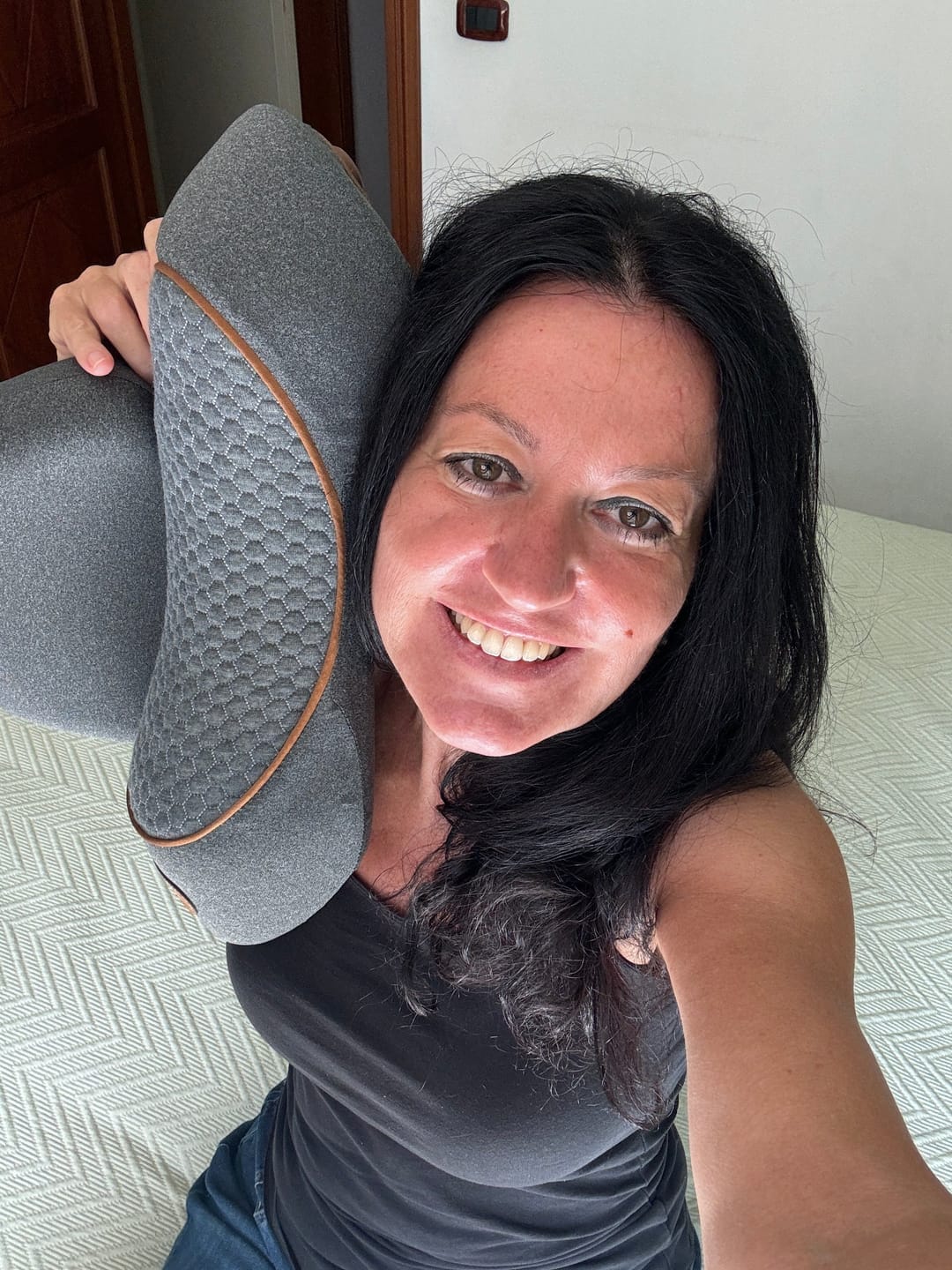 Customer smiling after neck pain relief