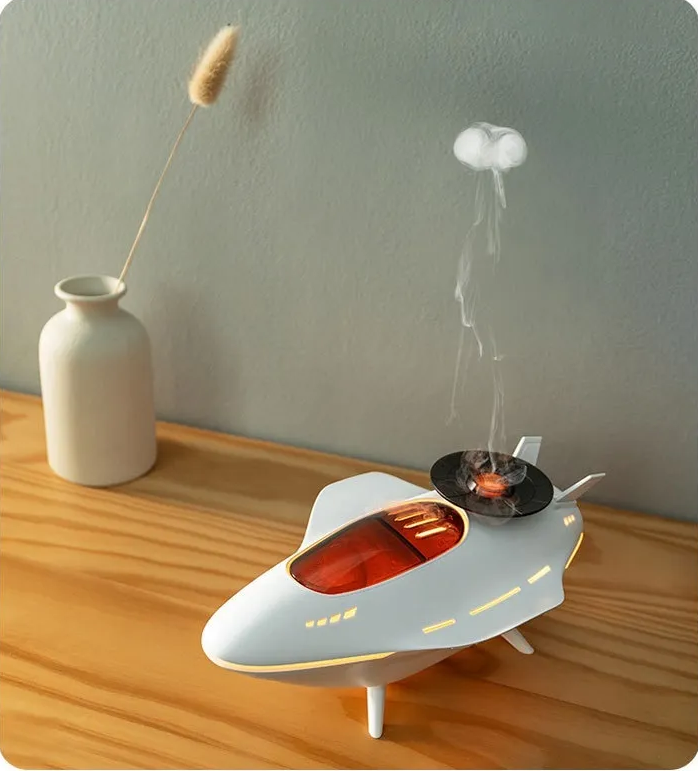Illustration showing the power button being pressed for mist