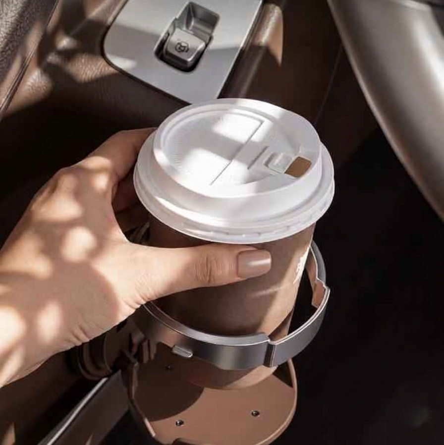Foldable car door cup holder attached to vehicle door