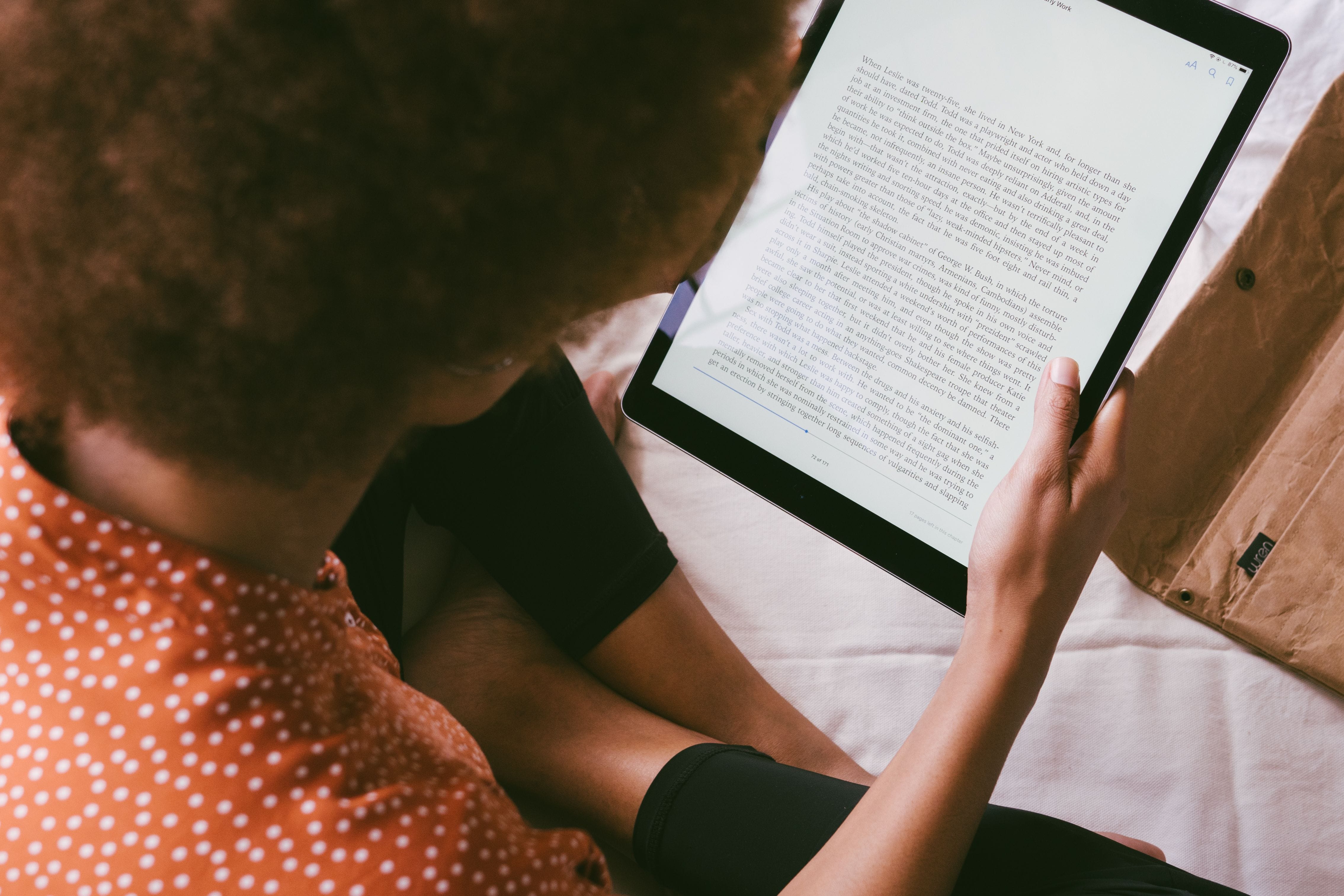 Mother feeling empowered using parenting playbook