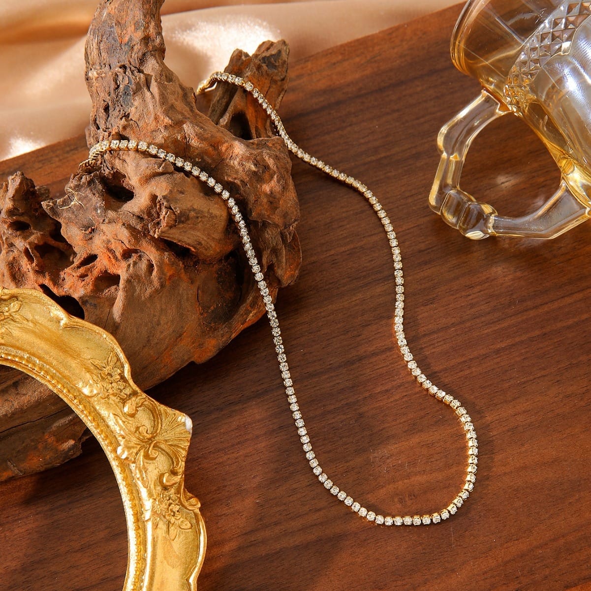 Layered gold necklaces on woman