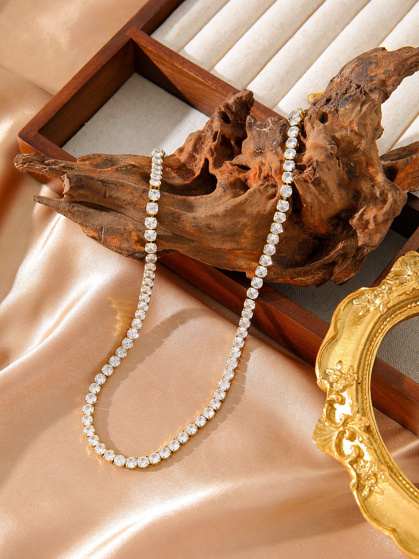 Close up of woman smiling wearing necklace