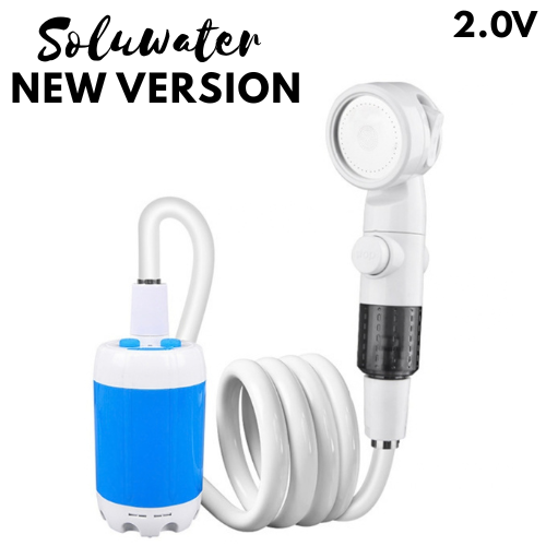 A person enjoying a refreshing shower outdoors using the portable Soluater device while camping in the wilderness.