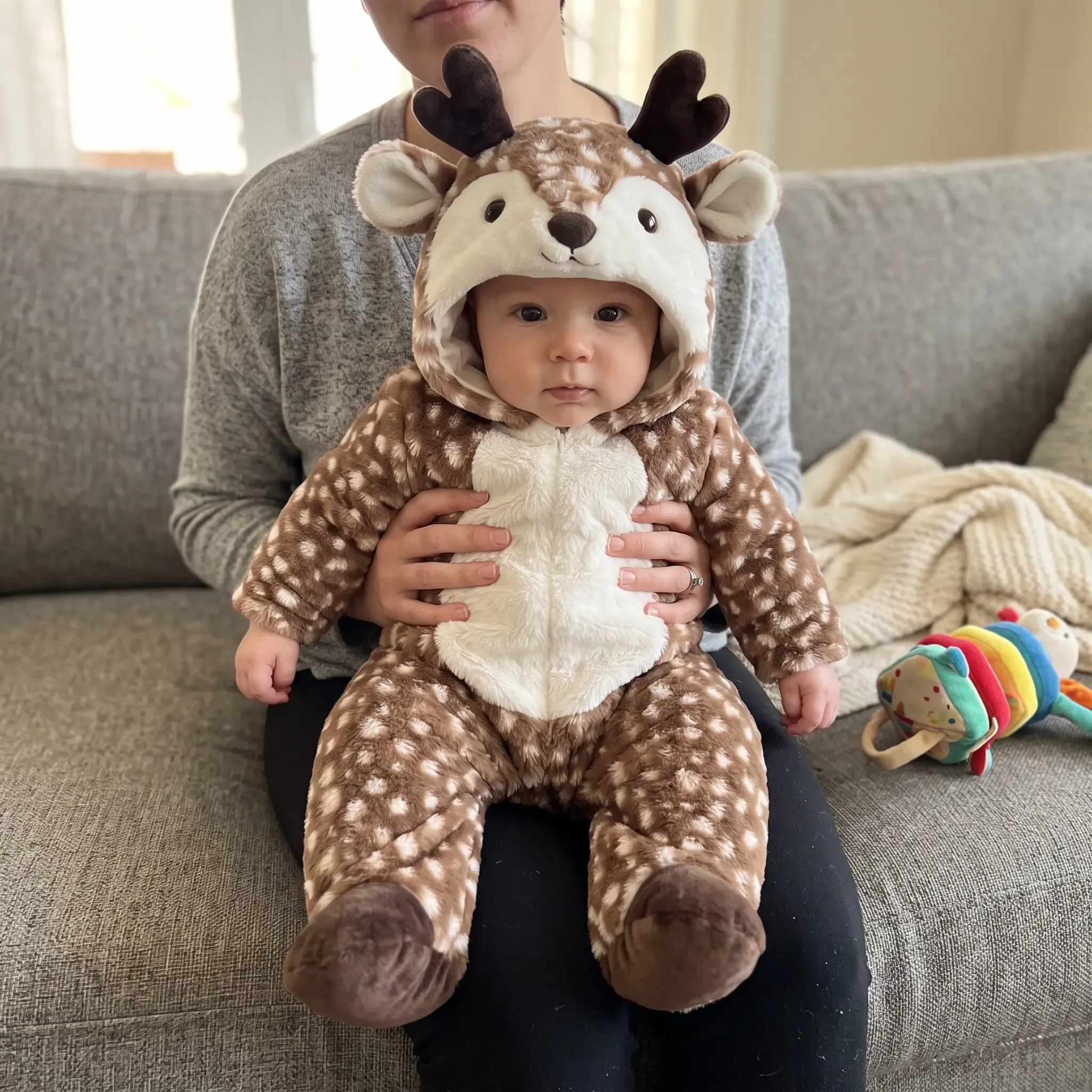Toddler wearing deer costume