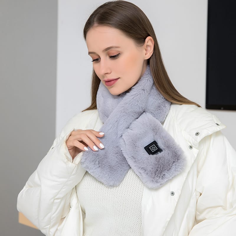 Person wearing heated scarf