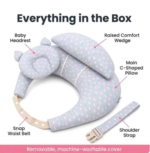 Mother using the Cuddle Nest Pillow with her baby