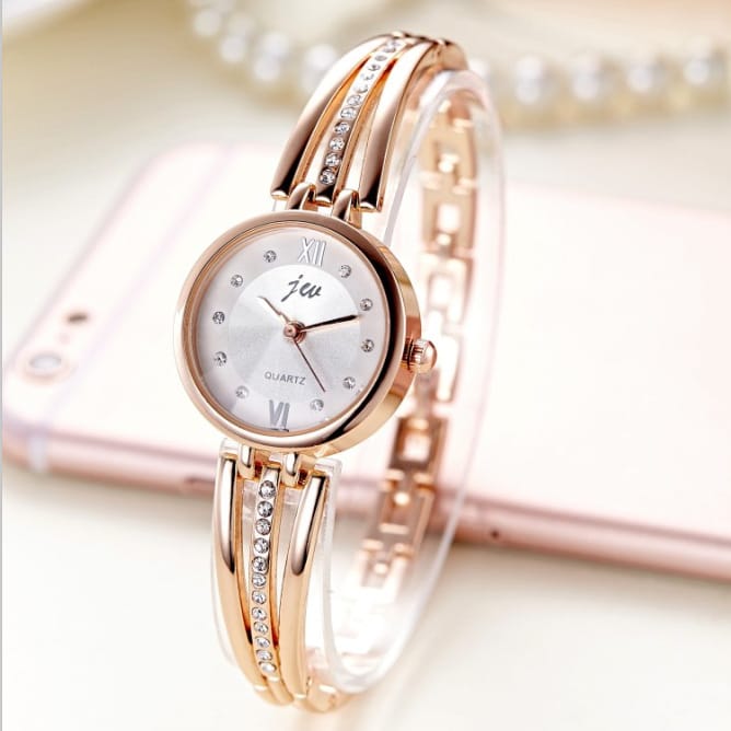 Montre élégante avec strass et bracelet en acier fin