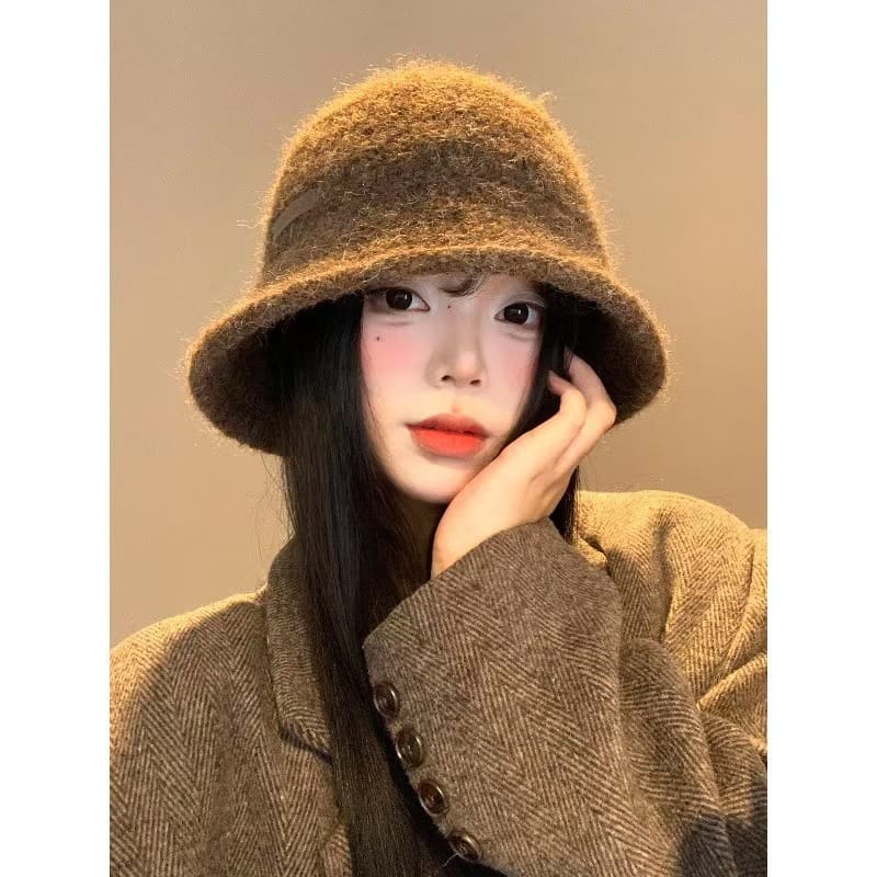 Close-up of warm knitted bucket hat texture and design